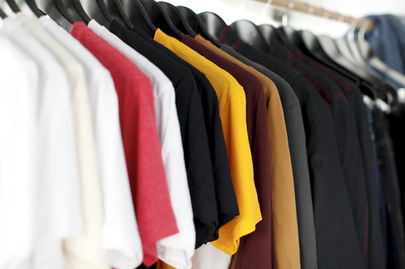 Ironed shirts on hangers with paper tag